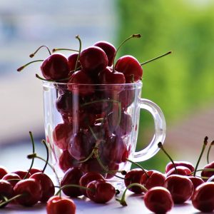 A jugful of fresh cherries