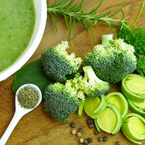 Vegetable soup with broccoli, leek, rosemary and other herbs